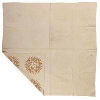 A Pieced Sunburst Quilt and a White Matelasse Coverlet
