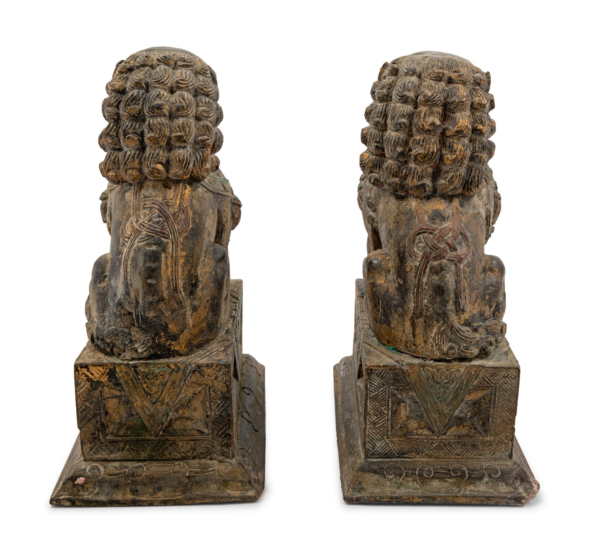 A Pair of Carved Wood Fu Lions