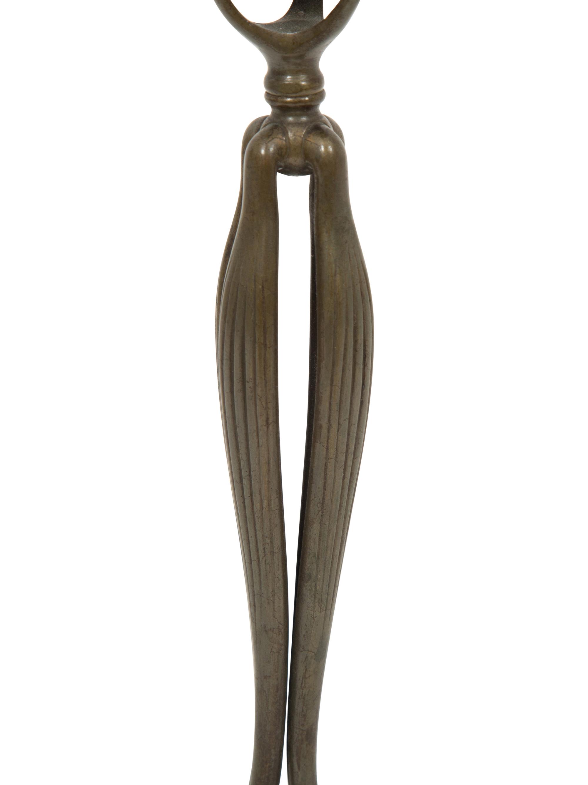 A Tiffany Studios Cat's Paw Bronze Candlestick