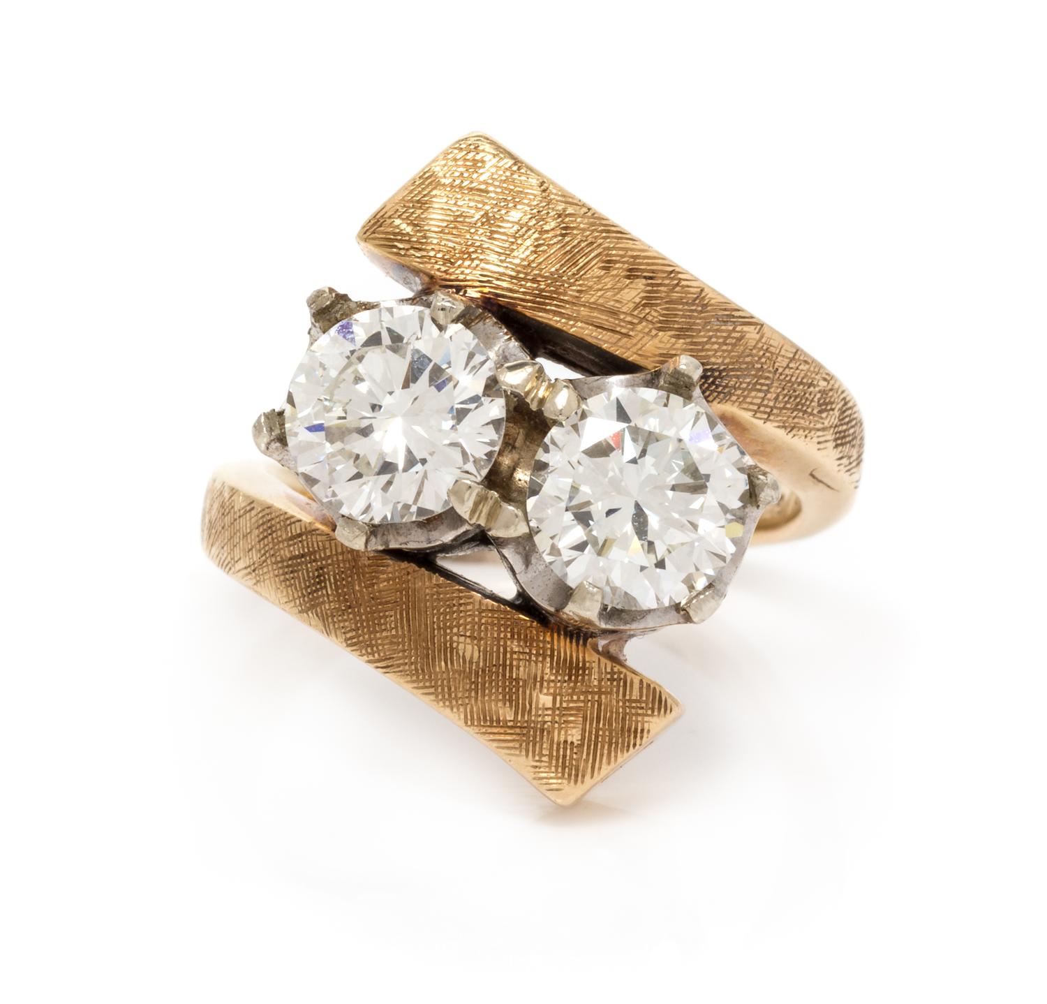 A Bicolor Gold and Diamond Bypass Ring, 4.55 dwts.