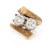 A Bicolor Gold and Diamond Bypass Ring, 4.55 dwts.