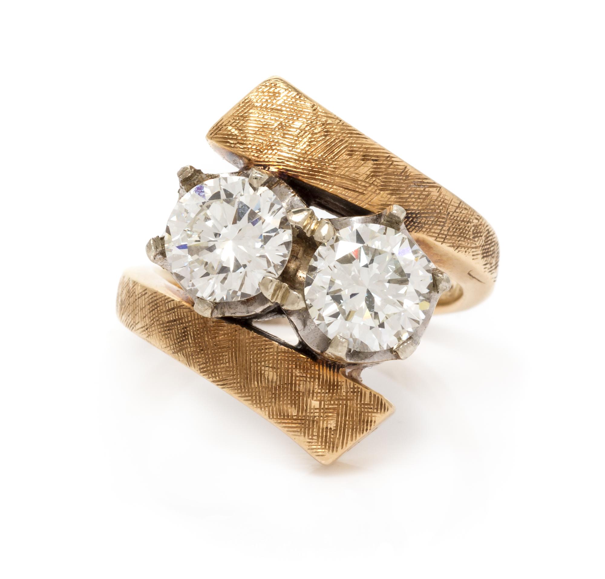 A Bicolor Gold and Diamond Bypass Ring, 4.55 dwts.