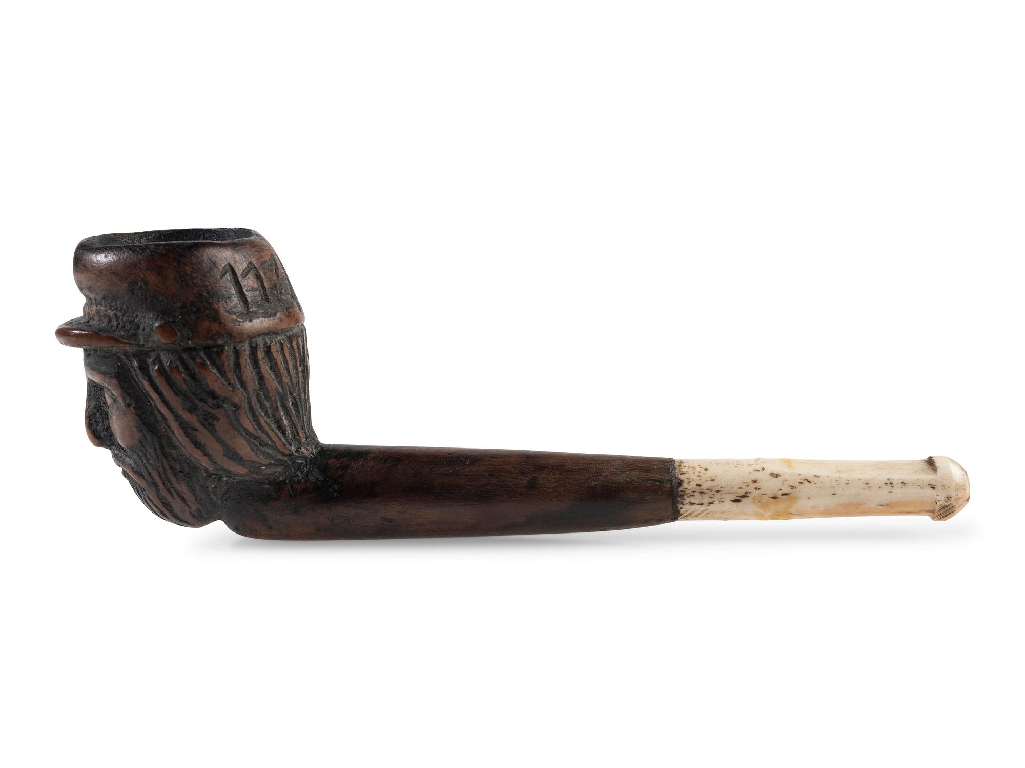 Civil War soldier folk art carved pipe identified to the 117th New York Volunteers.