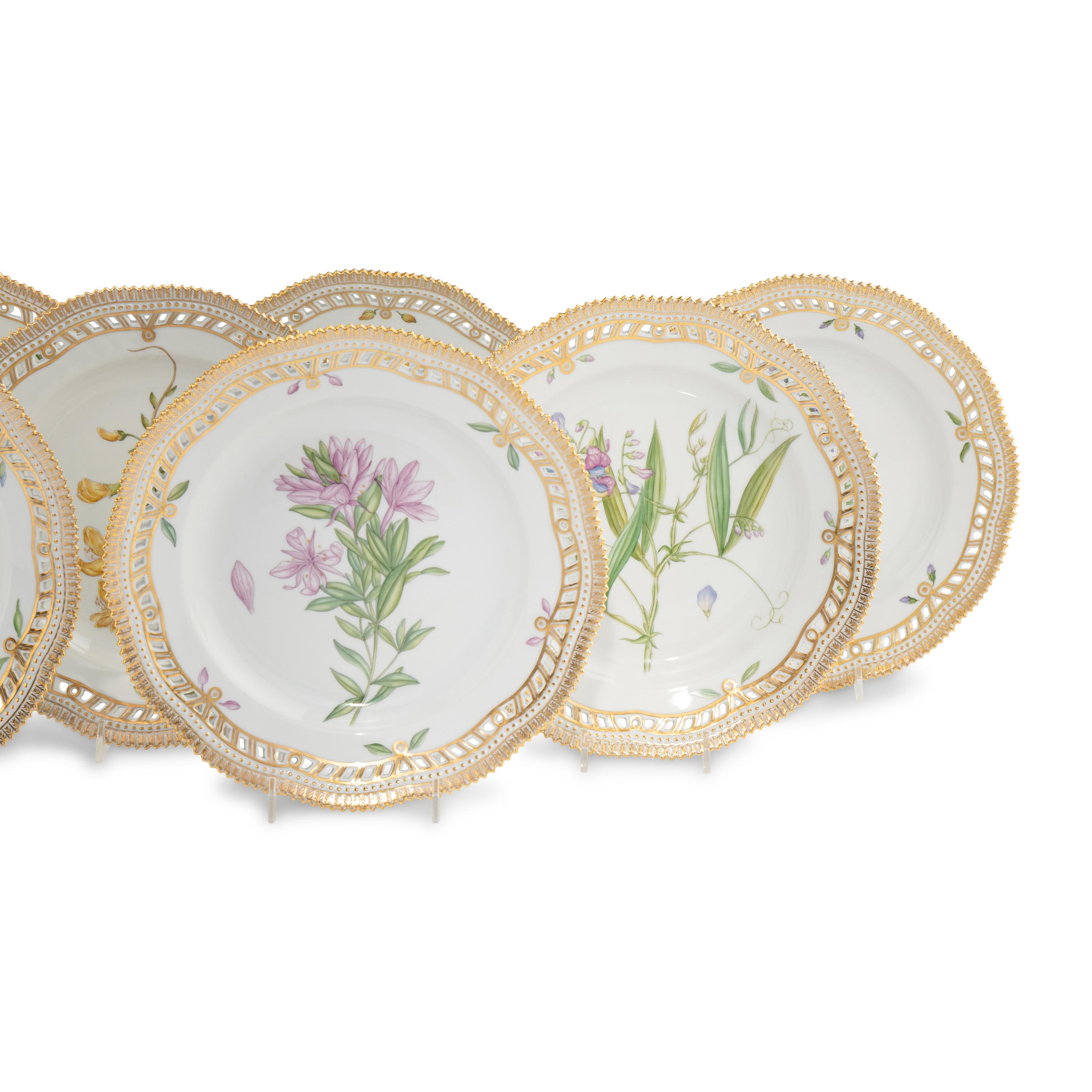 A Set of Nine Royal Copenhagen Flora Danica Porcelain Dinner Plates