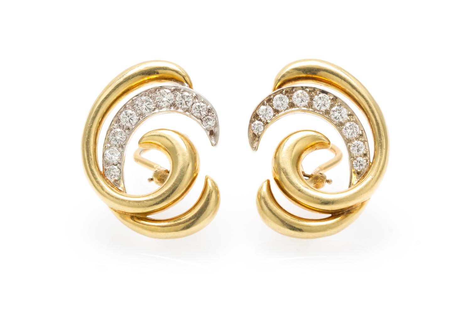 A Pair of 18 Karat Gold and Diamond Earclips, 9.60 dwts.