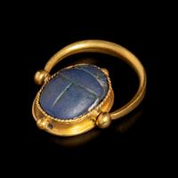 An Egyptian Faience Scarab Swivel Ring