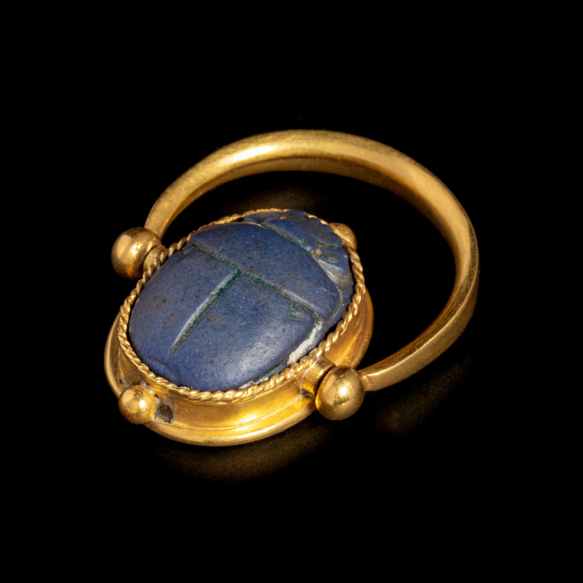 An Egyptian Faience Scarab Swivel Ring