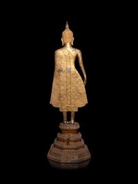 A Thai Gilt Bronze Figure of Standing Buddha