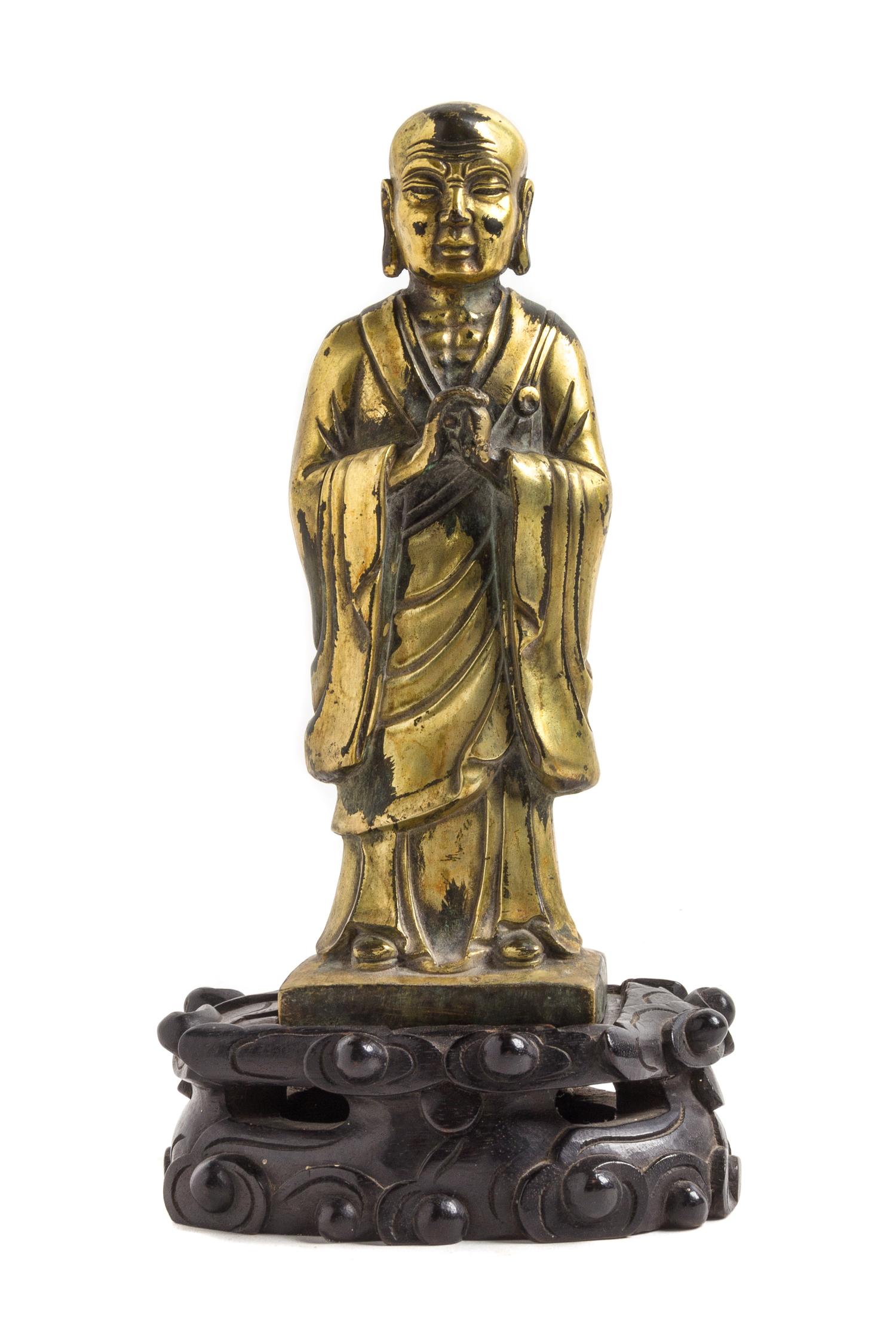A Gilt Bronze Figure of a Monk — 19TH CENTURY