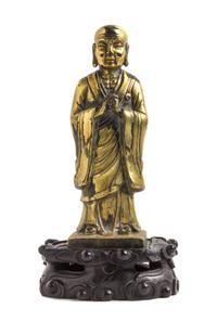 A Gilt Bronze Figure of a Monk — 19TH CENTURY
