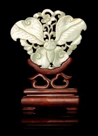 A Chinese Carved Celadon Jade Butterfly-Form Pendant