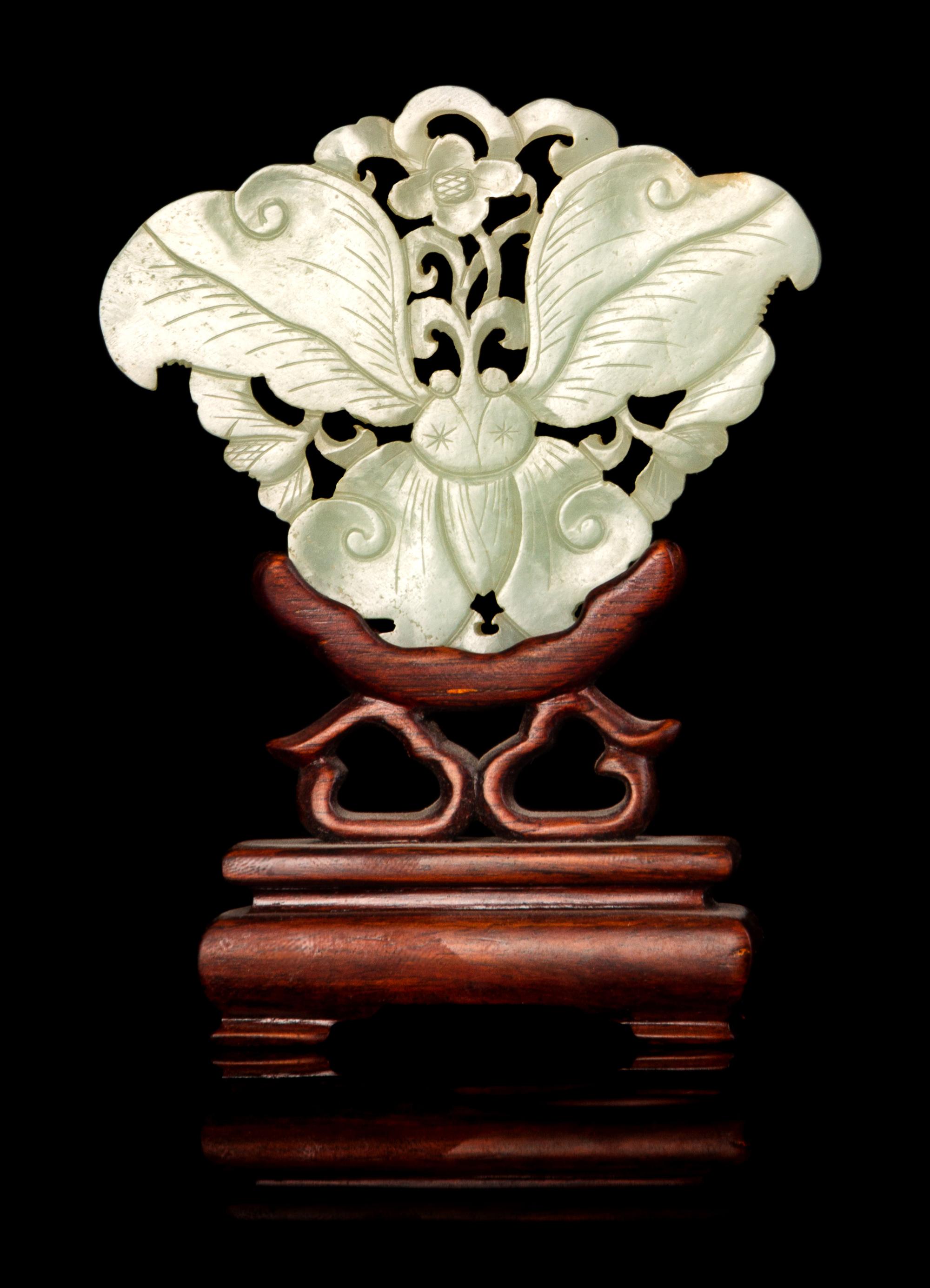 A Chinese Carved Celadon Jade Butterfly-Form Pendant