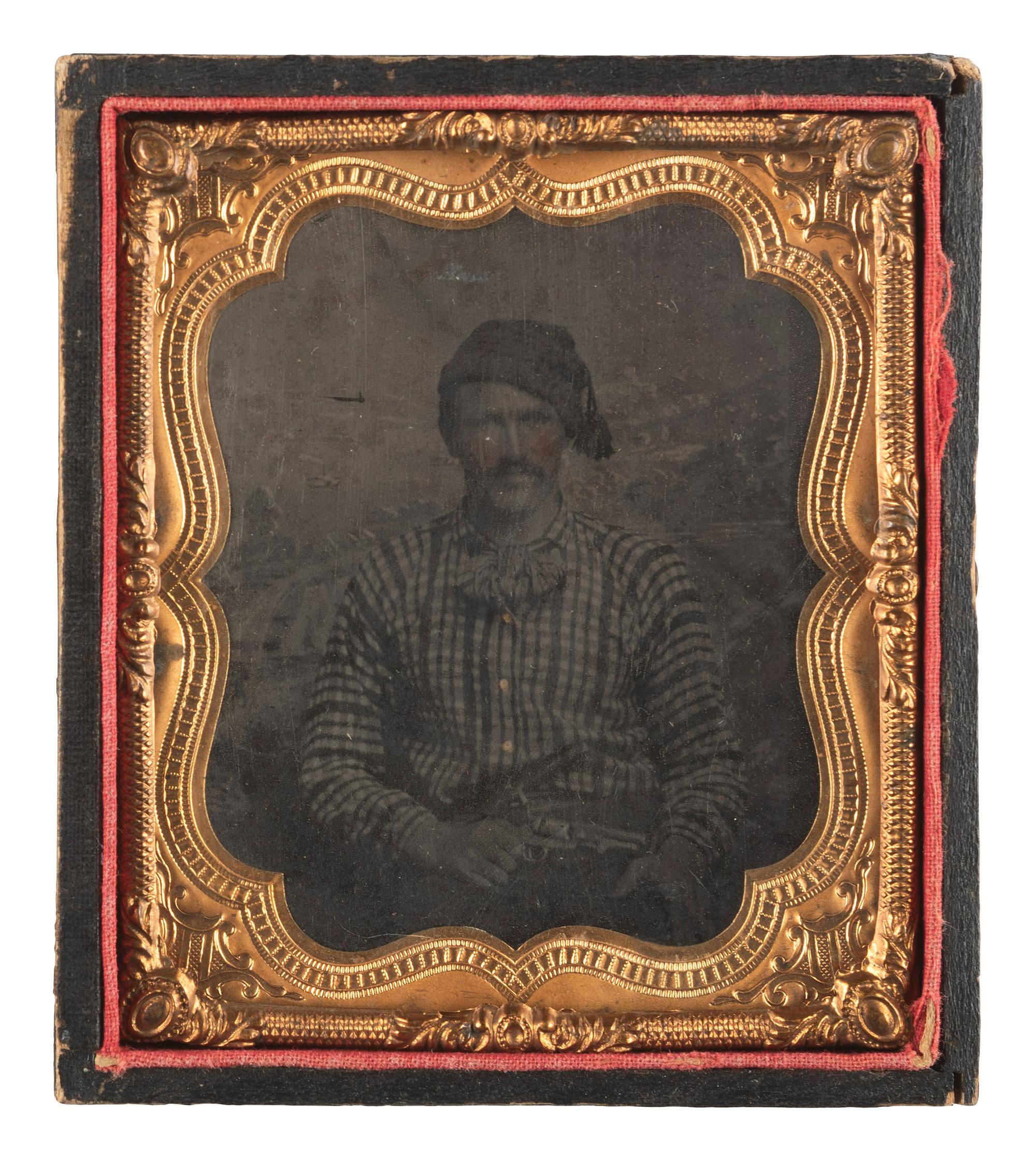 [CIVIL WAR]. Sixth plate tintype of a hearty fellow displaying a Model 1849 Colt pocket revolver and a sheathed Bowie knife.