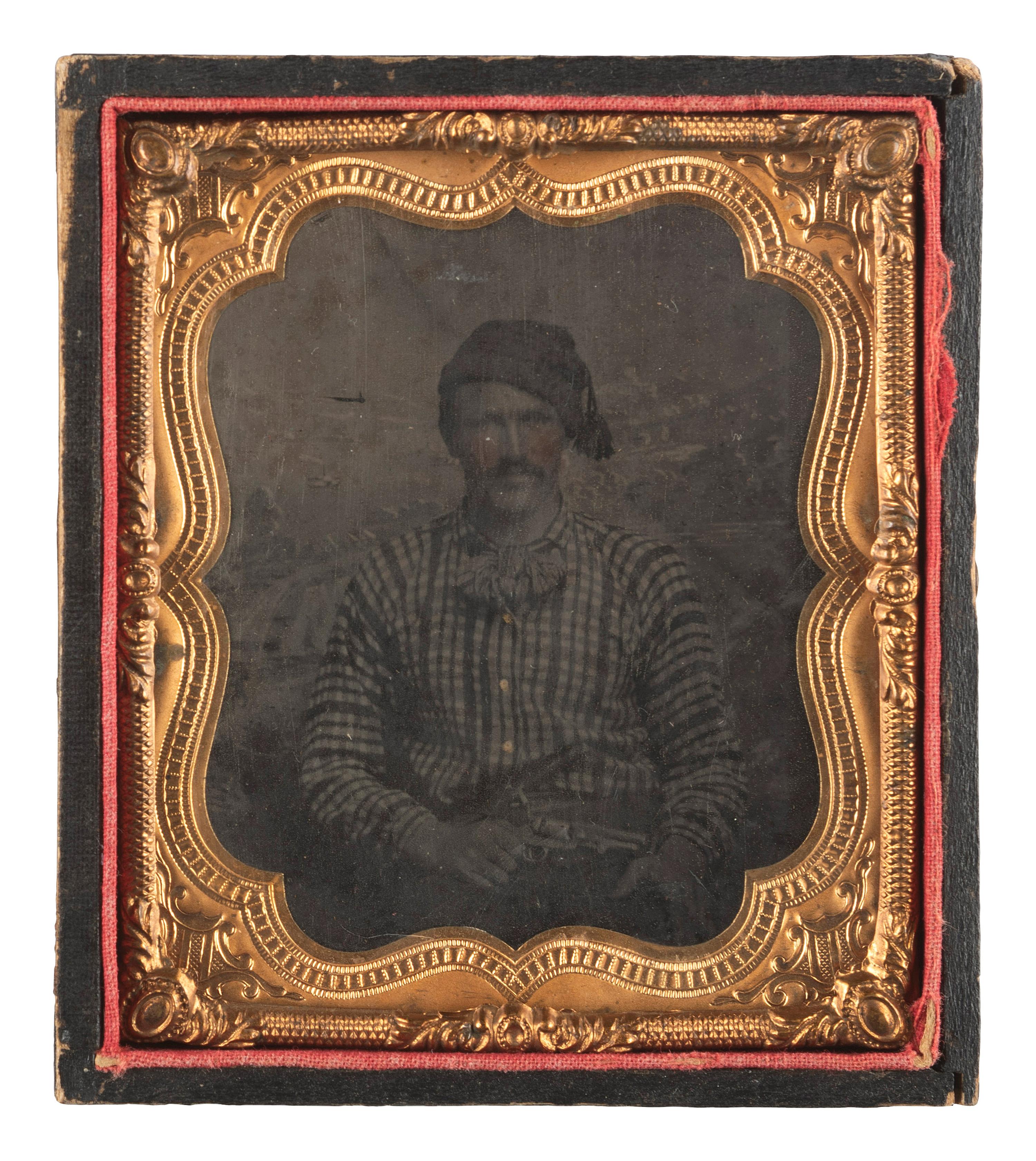 [CIVIL WAR]. Sixth plate tintype of a hearty fellow displaying a Model 1849 Colt pocket revolver and a sheathed Bowie knife.