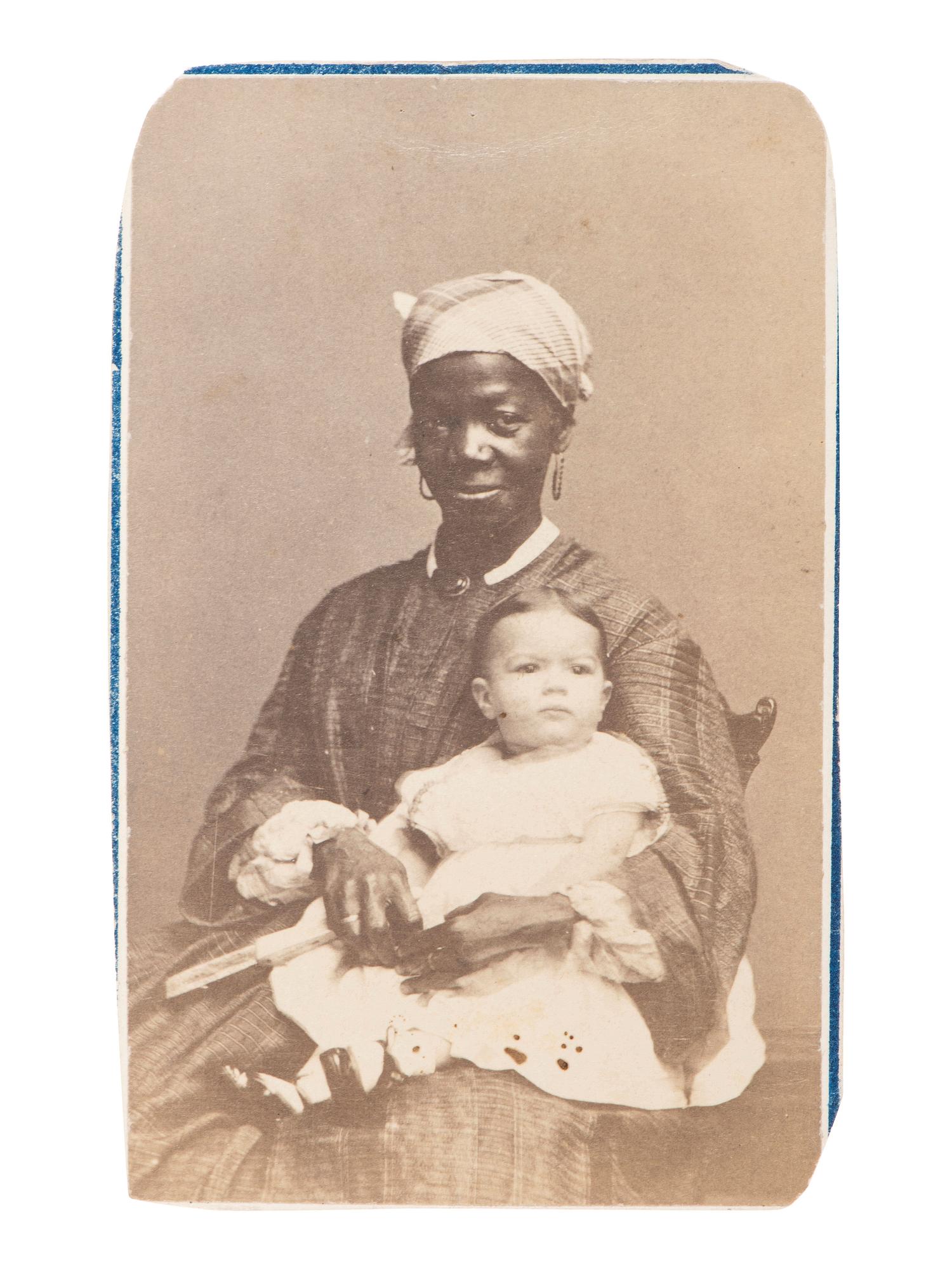[AFRICAN AMERICANA - EARLY PHOTOGRAPHY]. CDV of an African American nanny and child. New York, NY: Fredricks & Co., ca 1864-1866.