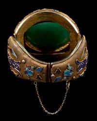 An Apple Green and Pale Celadon Jadeite Inset and Enamel Inlaid Silver-Gilt Filigree Bracelet