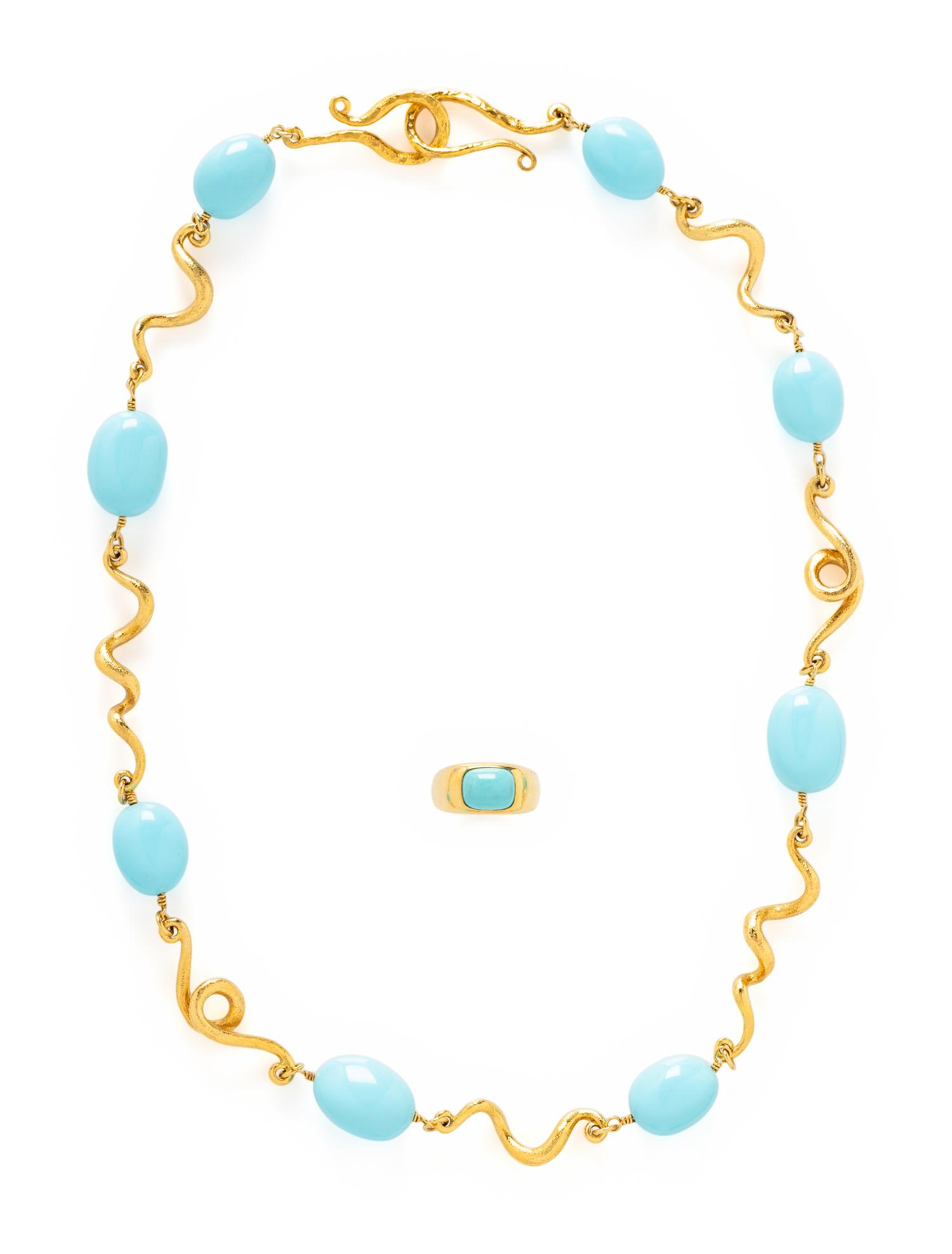 COLLECTION OF YELLOW GOLD AND BLUE STONE JEWELRY