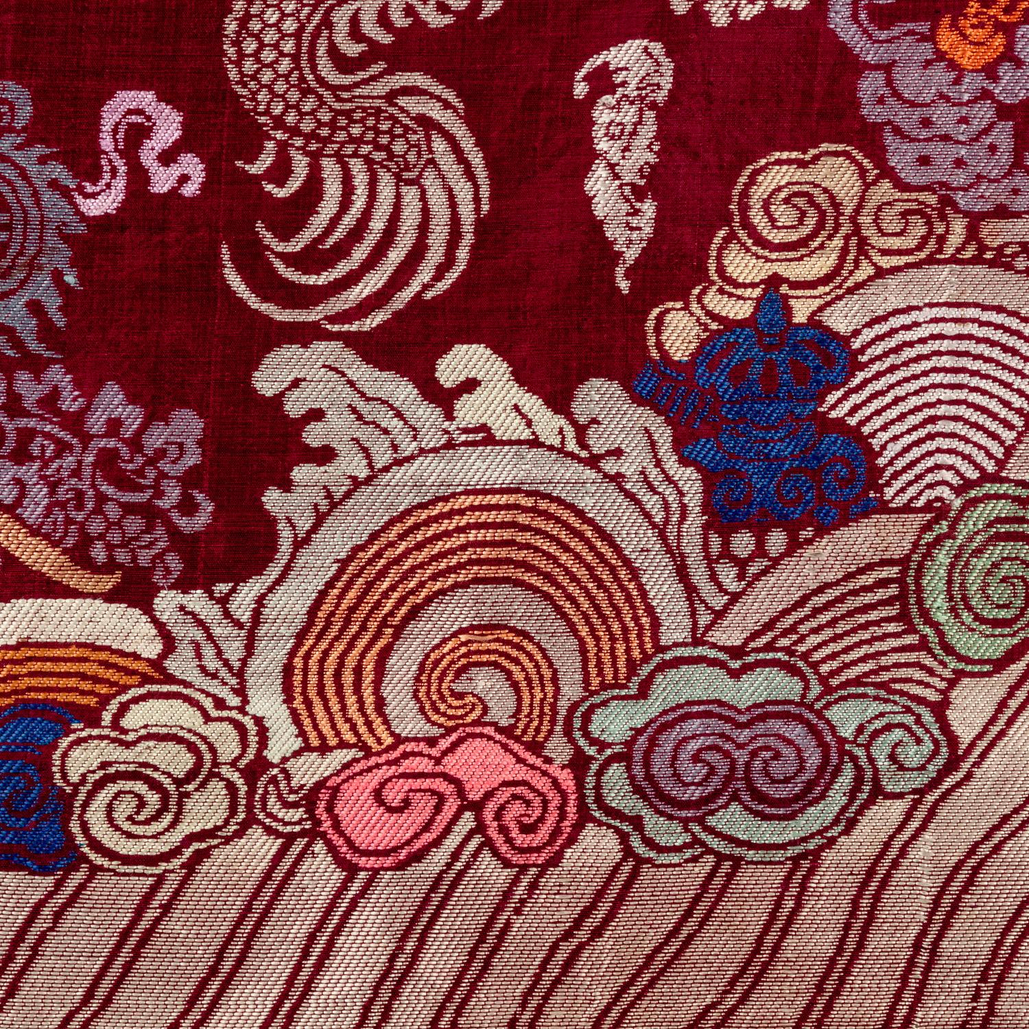 A Chinese Maroon Ground Silk Brocade 'Dragon' Robe, Jifu, Late Qing Dynasty 清晚期 絳紅地織錦龍紋吉服