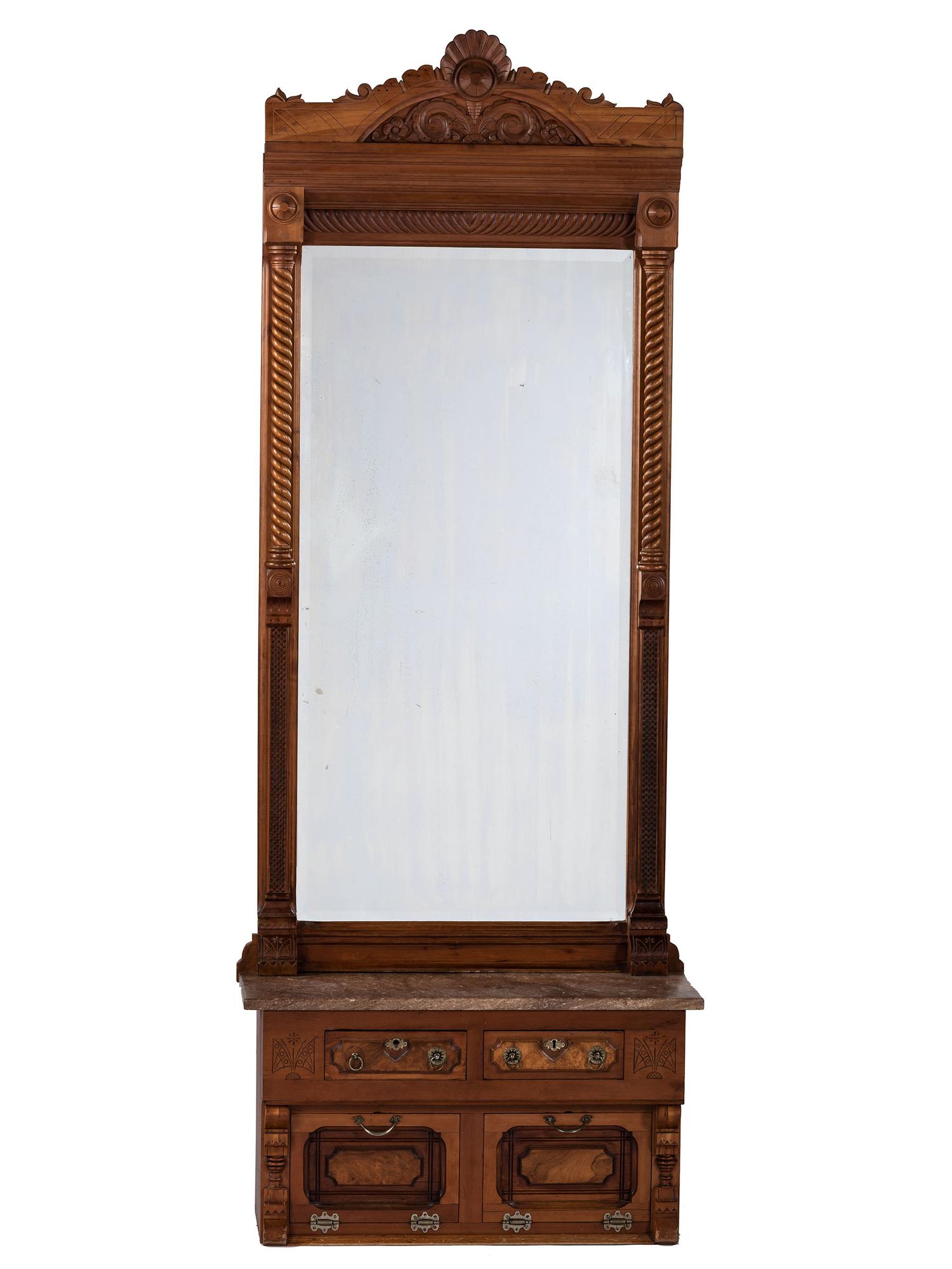 An Eastlake Style Hall Mirror with Marble Top Cabinet Base