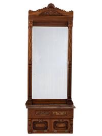 An Eastlake Style Hall Mirror with Marble Top Cabinet Base