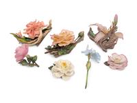 A Group of Seven Porcelain Flowers