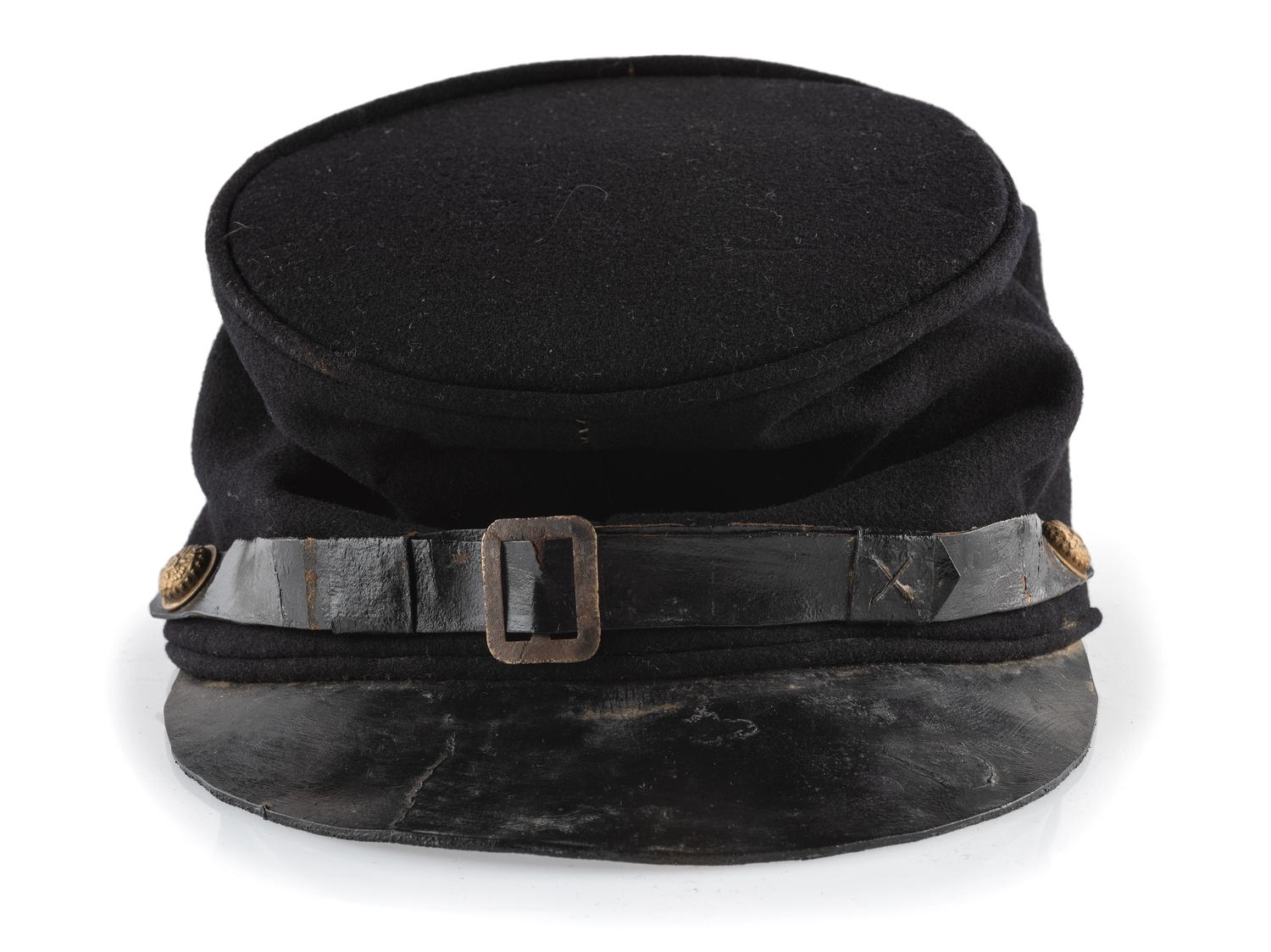 [CIVIL WAR]. A collection of items attributed to Thomas W. Johnson, Co. K, 4th Delaware Infantry, incl. frock coat, cap, belt rig, and cartridge box.