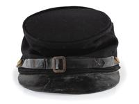 [CIVIL WAR]. A collection of items attributed to Thomas W. Johnson, Co. K, 4th Delaware Infantry, incl. frock coat, cap, belt rig, and cartridge box.