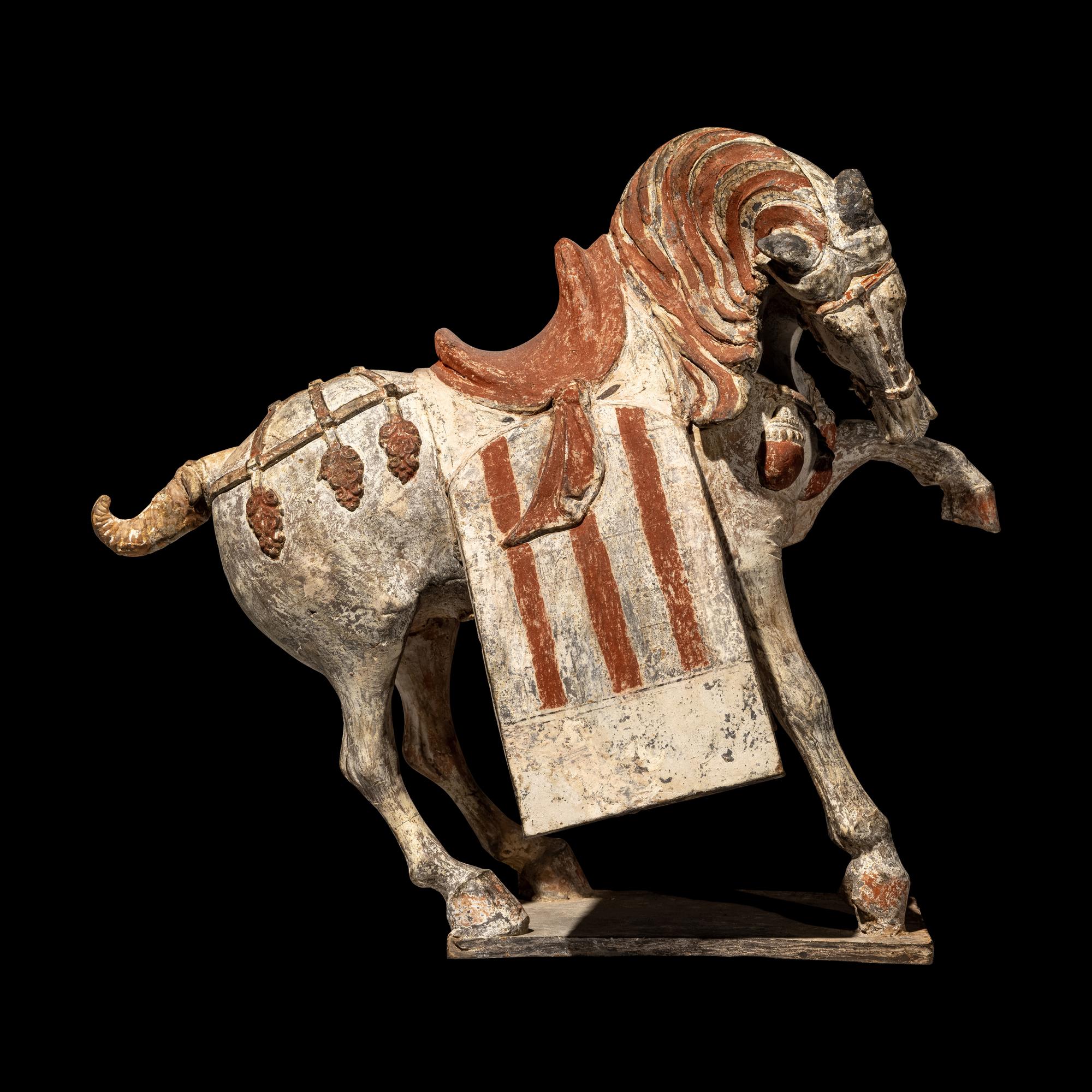 A Chinese Painted Pottery Figure of a Horse