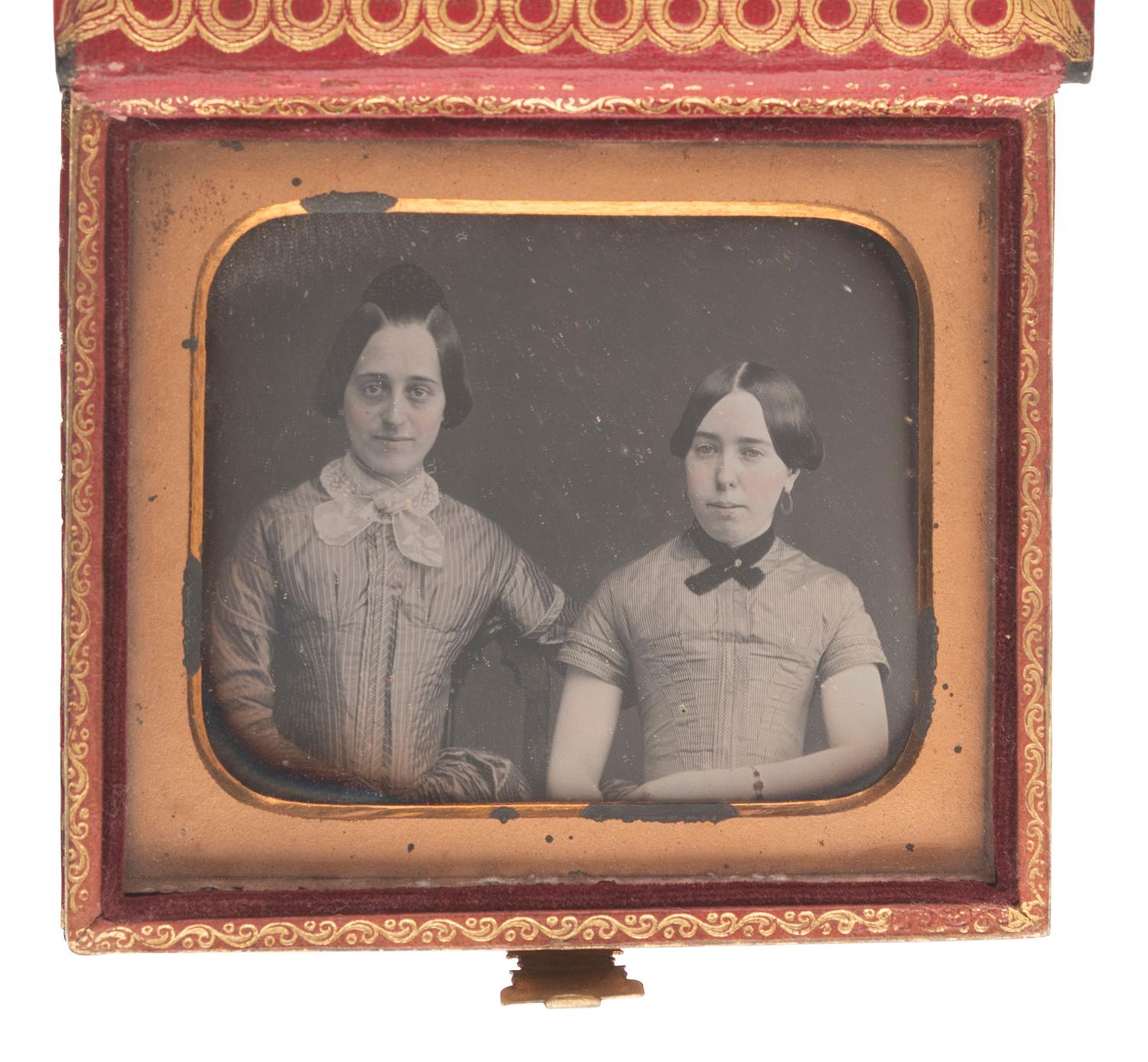 [EARLY PHOTOGRAPHY]. 14 sixth plate daguerreotypes featuring pairs and trios of sitters.