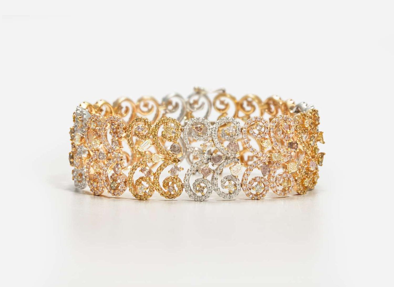 A Three-Tone Rose, White, and Yellow Gold and Multicolor Diamond Bracelet