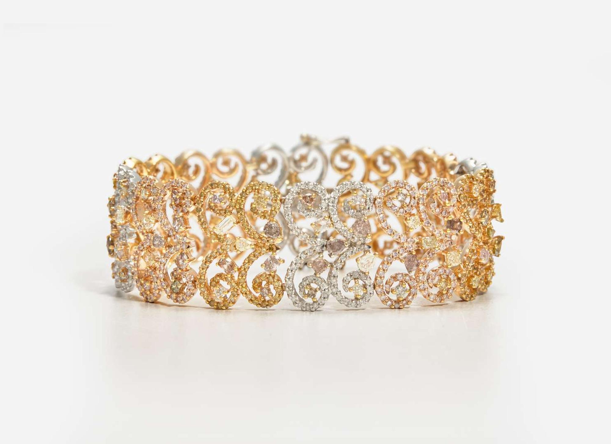 A Three-Tone Rose, White, and Yellow Gold and Multicolor Diamond Bracelet