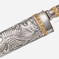 A repoussé silver and gold gaucho knife and flogger Heinrich Böker & Co. Arbolito S.A., Buenos Aires, Argentina, post 1983