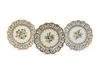 A Set of Three Majolica Plates