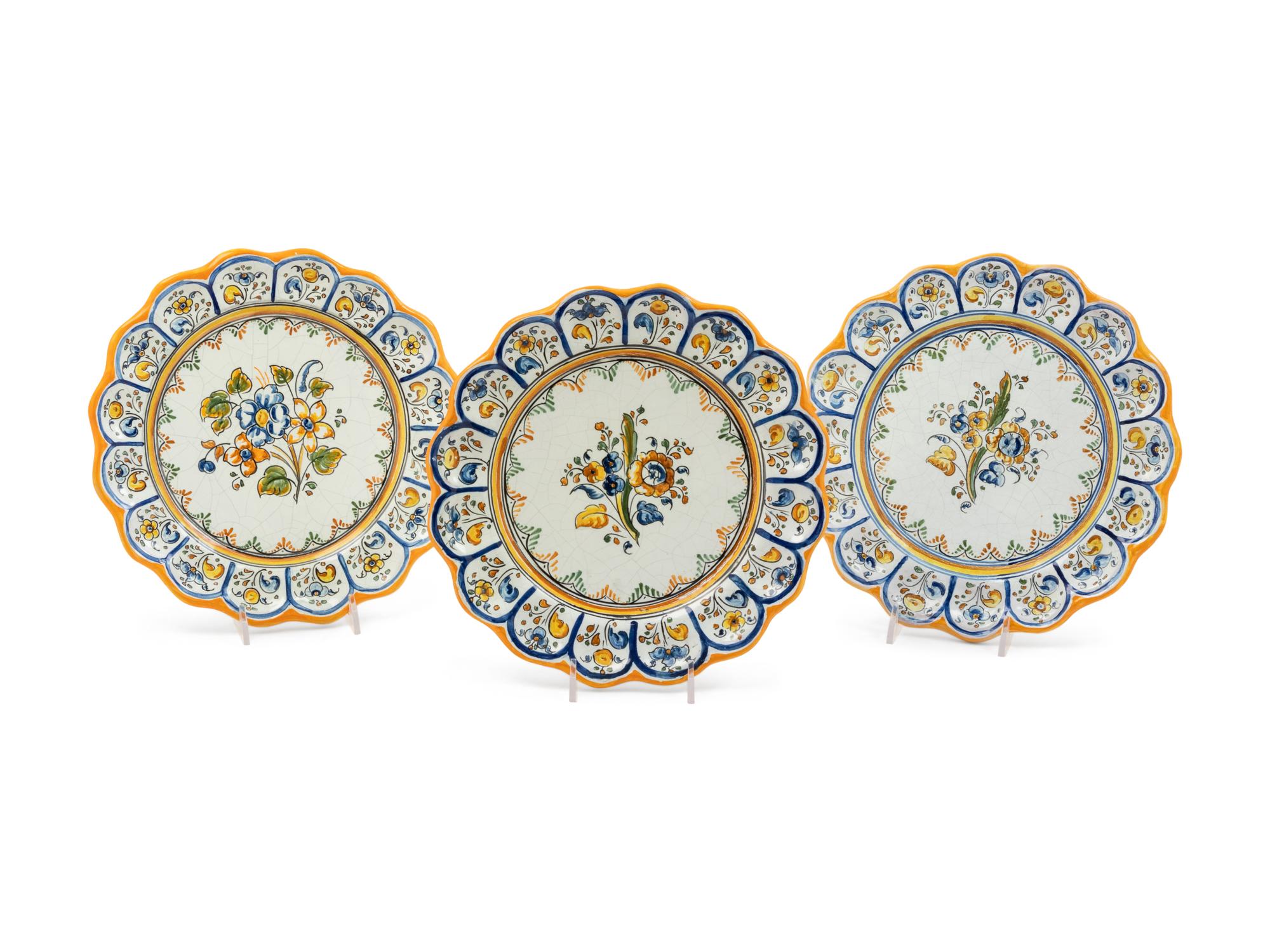 A Set of Three Majolica Plates