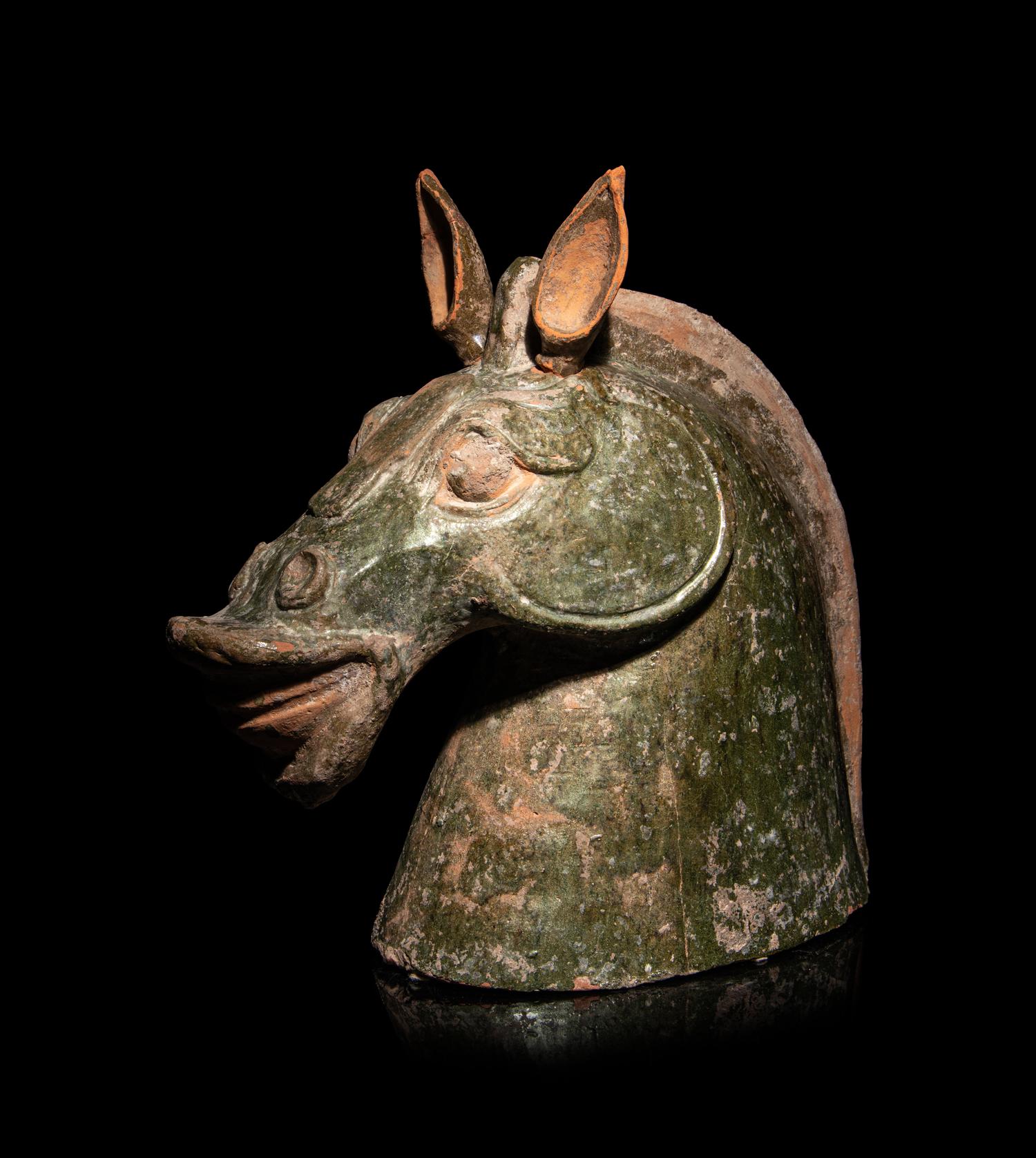 Three Chinese Pottery Equine Figures