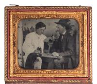 [EARLY PHOTOGRAPHY]. Sixth plate ruby ambrotype showing an intense game of checkers.