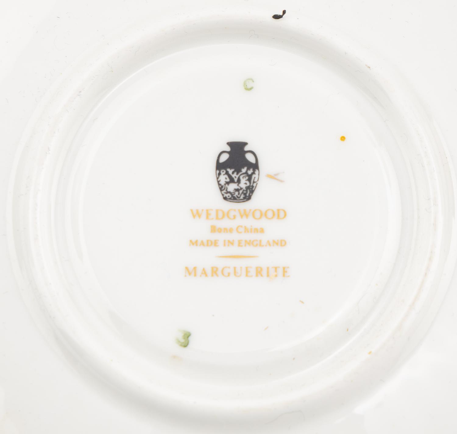 A Wedgwood Marguerite Porcelain Dinner Service