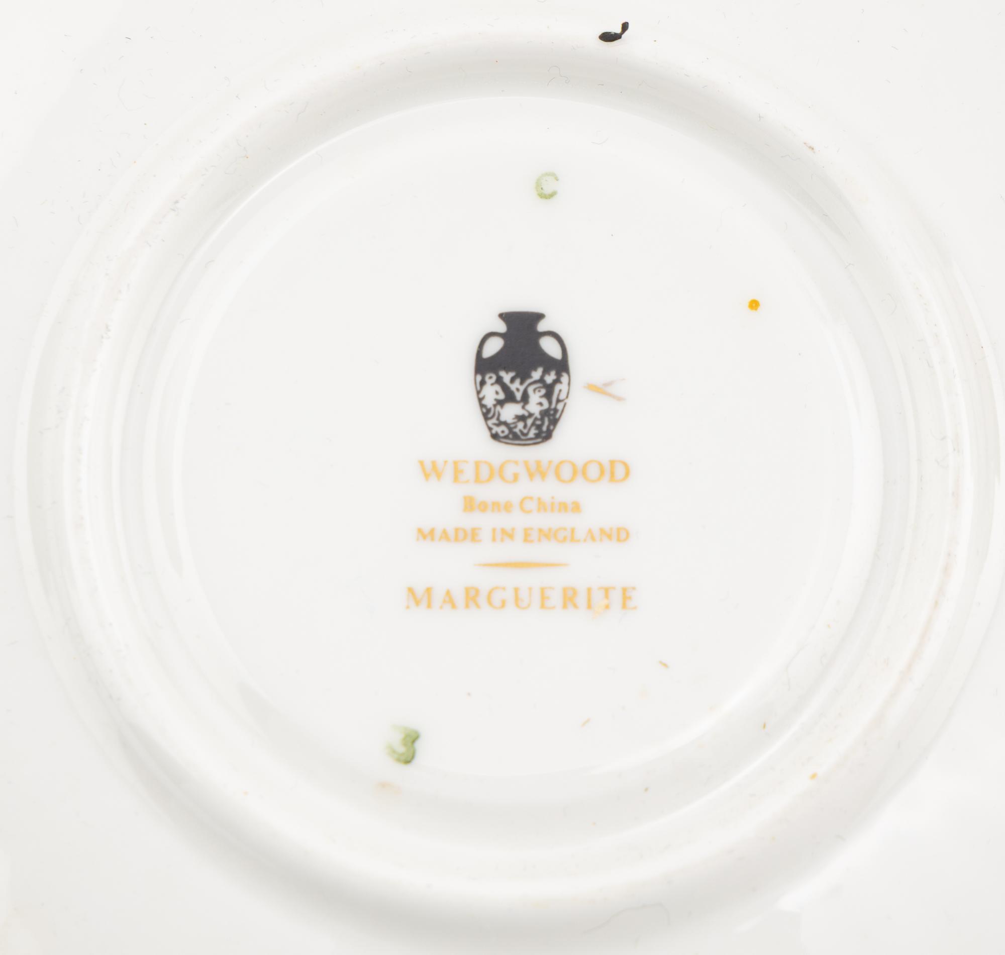 A Wedgwood Marguerite Porcelain Dinner Service