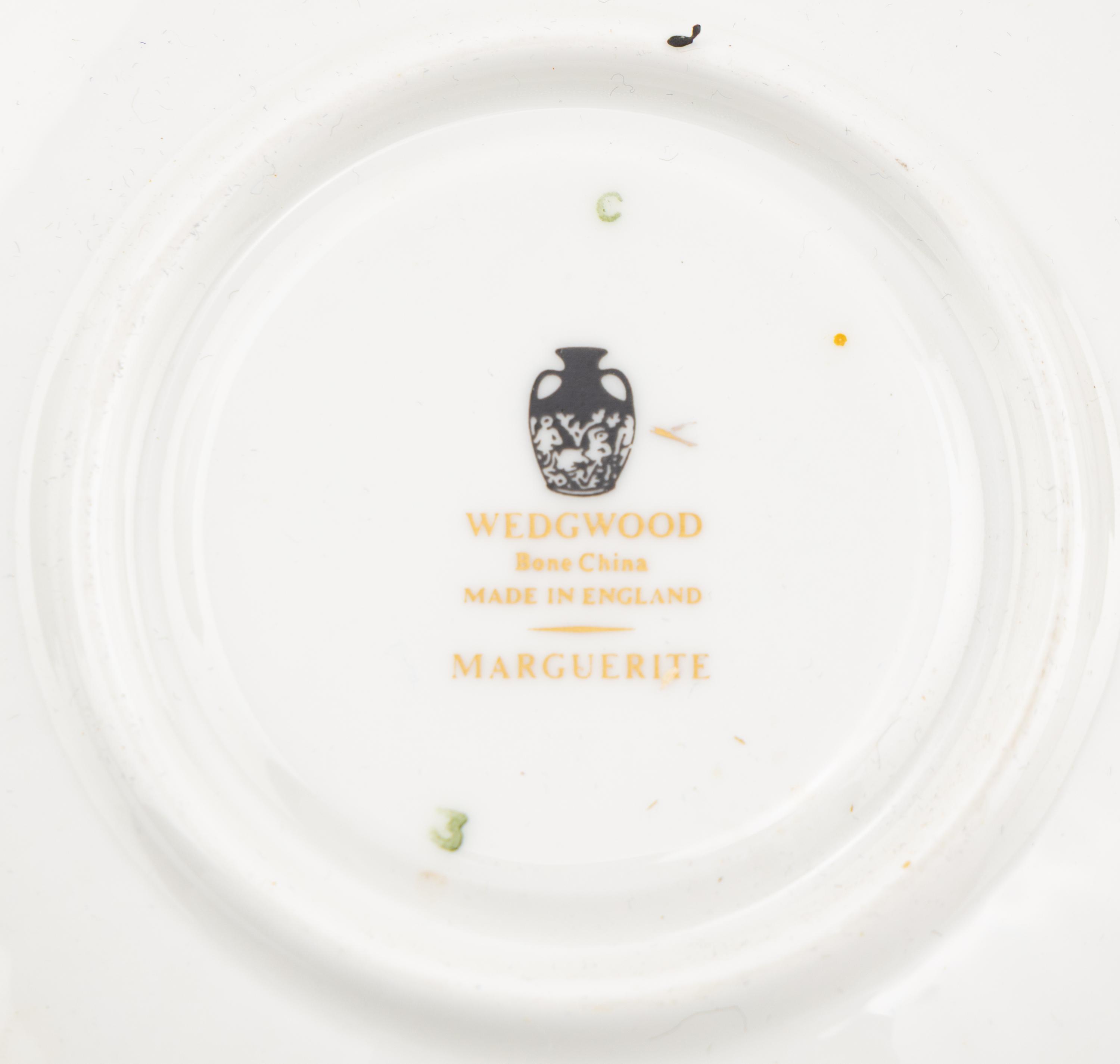 A Wedgwood Marguerite Porcelain Dinner Service