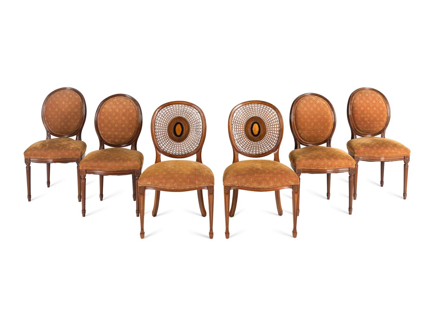 A Set of Six Louis XVI Style Dining Chairs