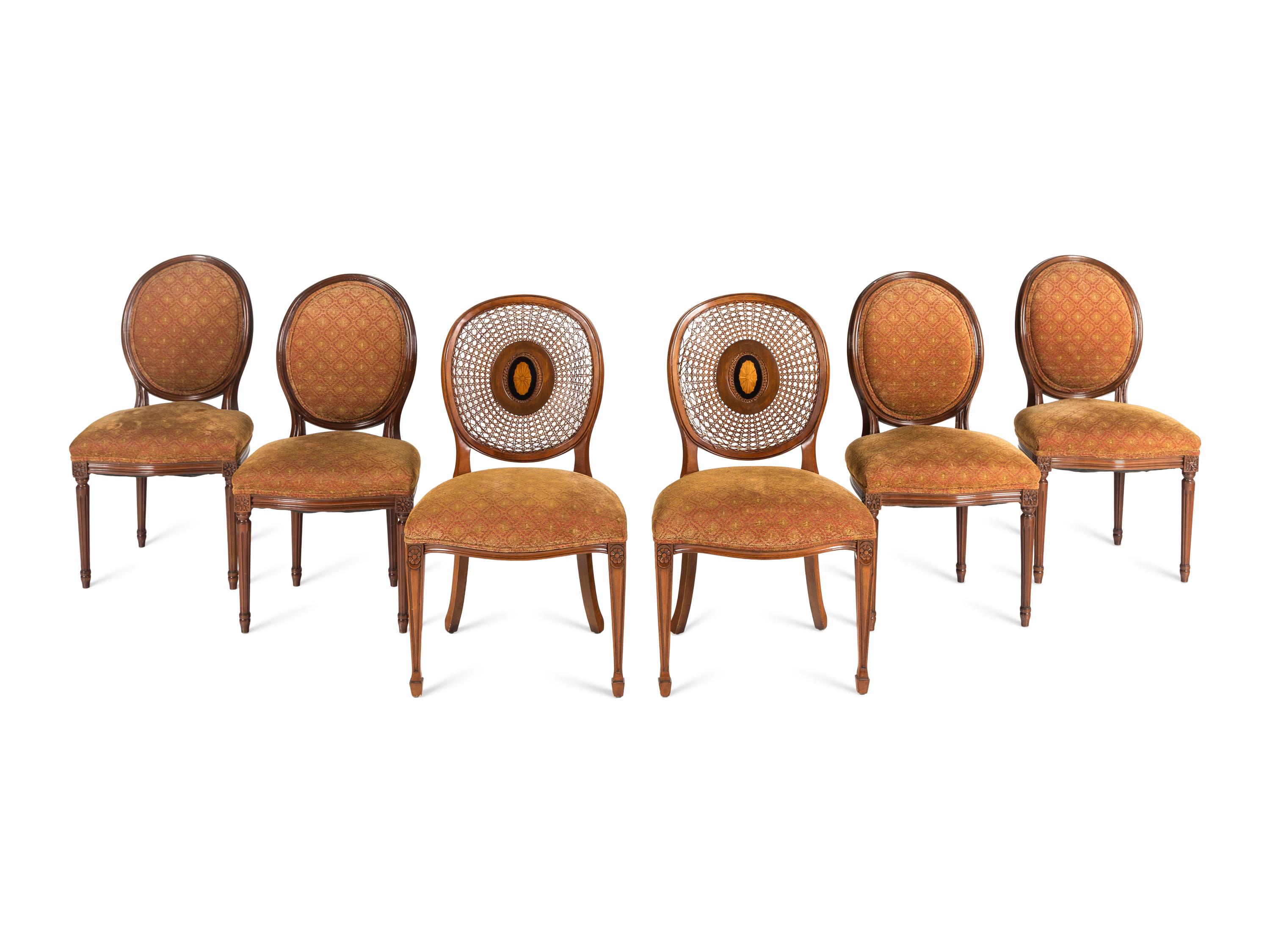 A Set of Six Louis XVI Style Dining Chairs