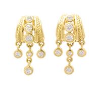 A Pair of 18 Karat Yellow Gold and Diamond Dangle Earclips, Judith Ripka, 7.90 dwts.
