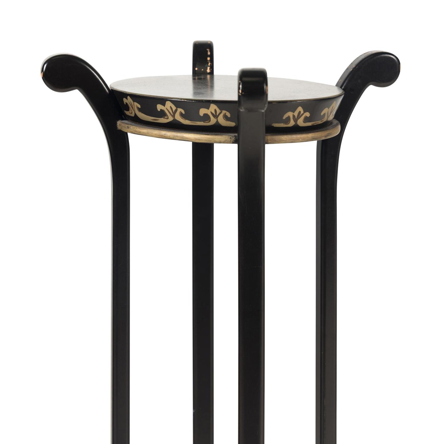 A Pair of Ebonized and Parcel-Gilt Jardinière Stands