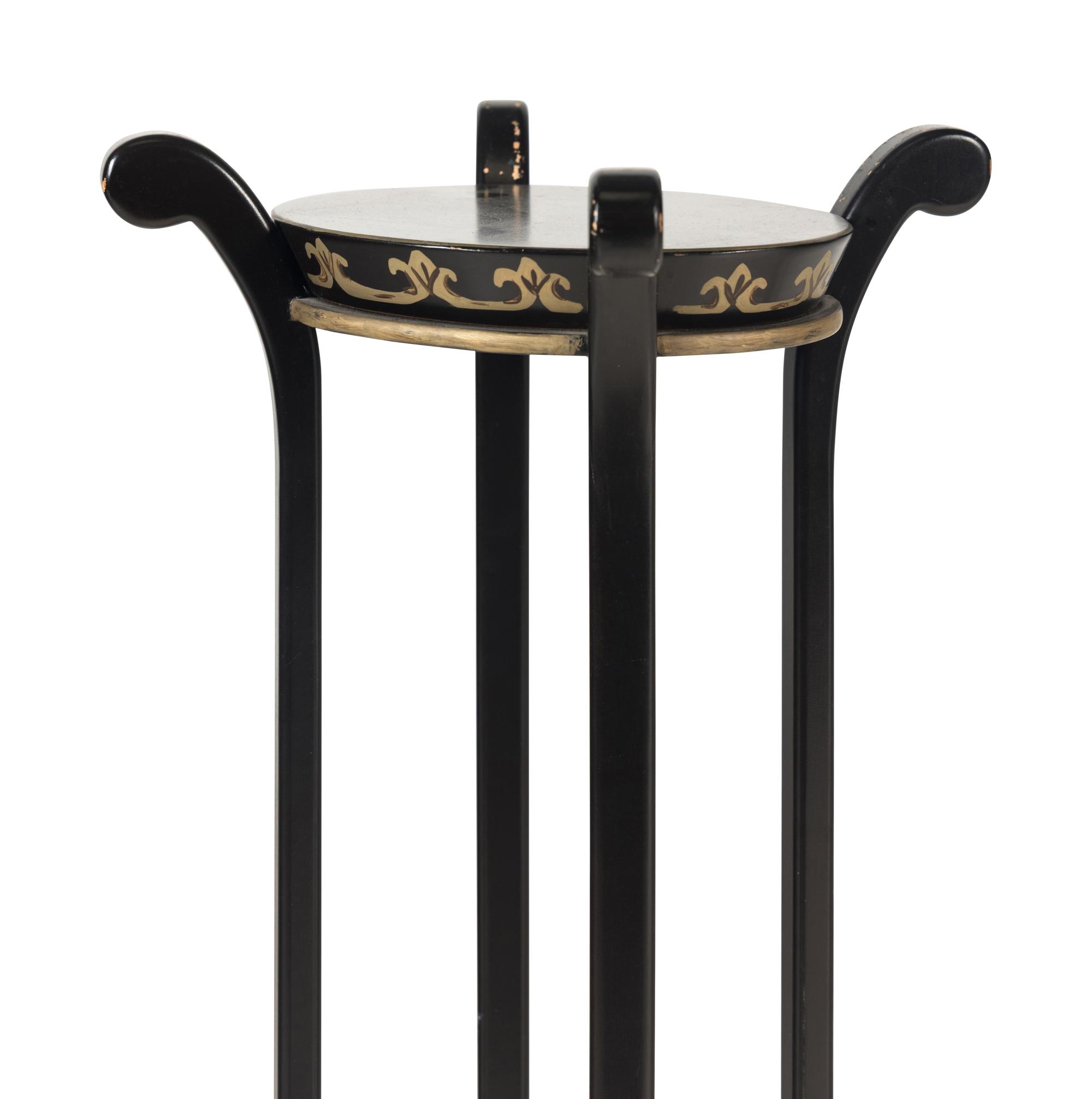 A Pair of Ebonized and Parcel-Gilt Jardinière Stands