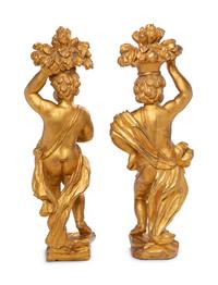 A Pair of Continental Carved Giltwood Putti Figures