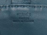 An Hermes Bleu Lin Agneau Clou de Selle Pouch, 6" x 9" x 1".