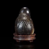 A Chinese dark blackish-brown and grey jade carving of a quail 玉雕鹧鸪 Ming to early Qing dynasty ????