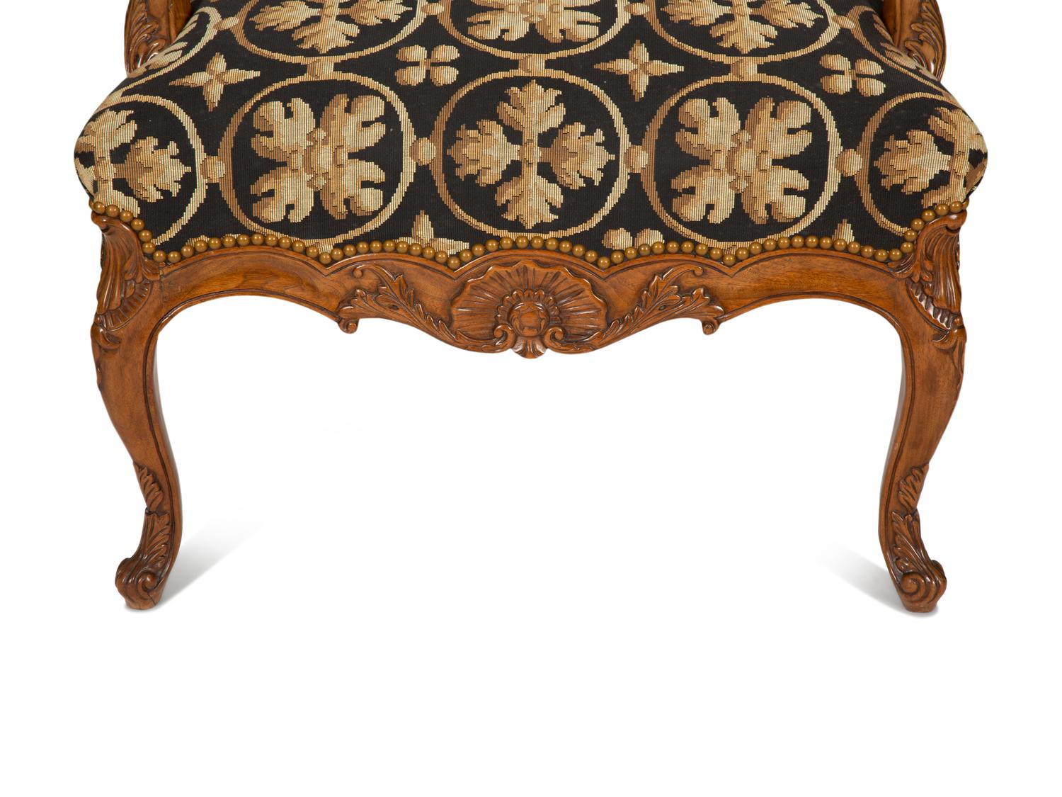 A Pair of Régence Style Upholstered Fauteuils