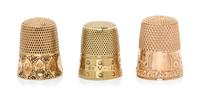 Three American Yellow Gold Thimbles, Various Makers, comprising a 14-karat gold example with engine turned decoration, Carter, Gough &