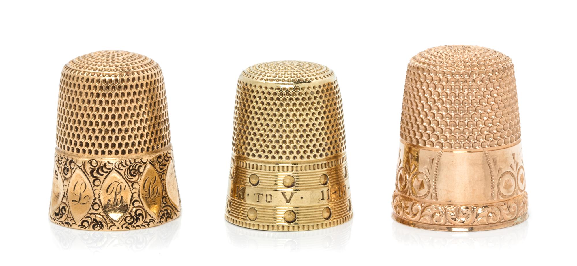 Three American Yellow Gold Thimbles, Various Makers, comprising a 14-karat gold example with engine turned decoration, Carter, Gough &